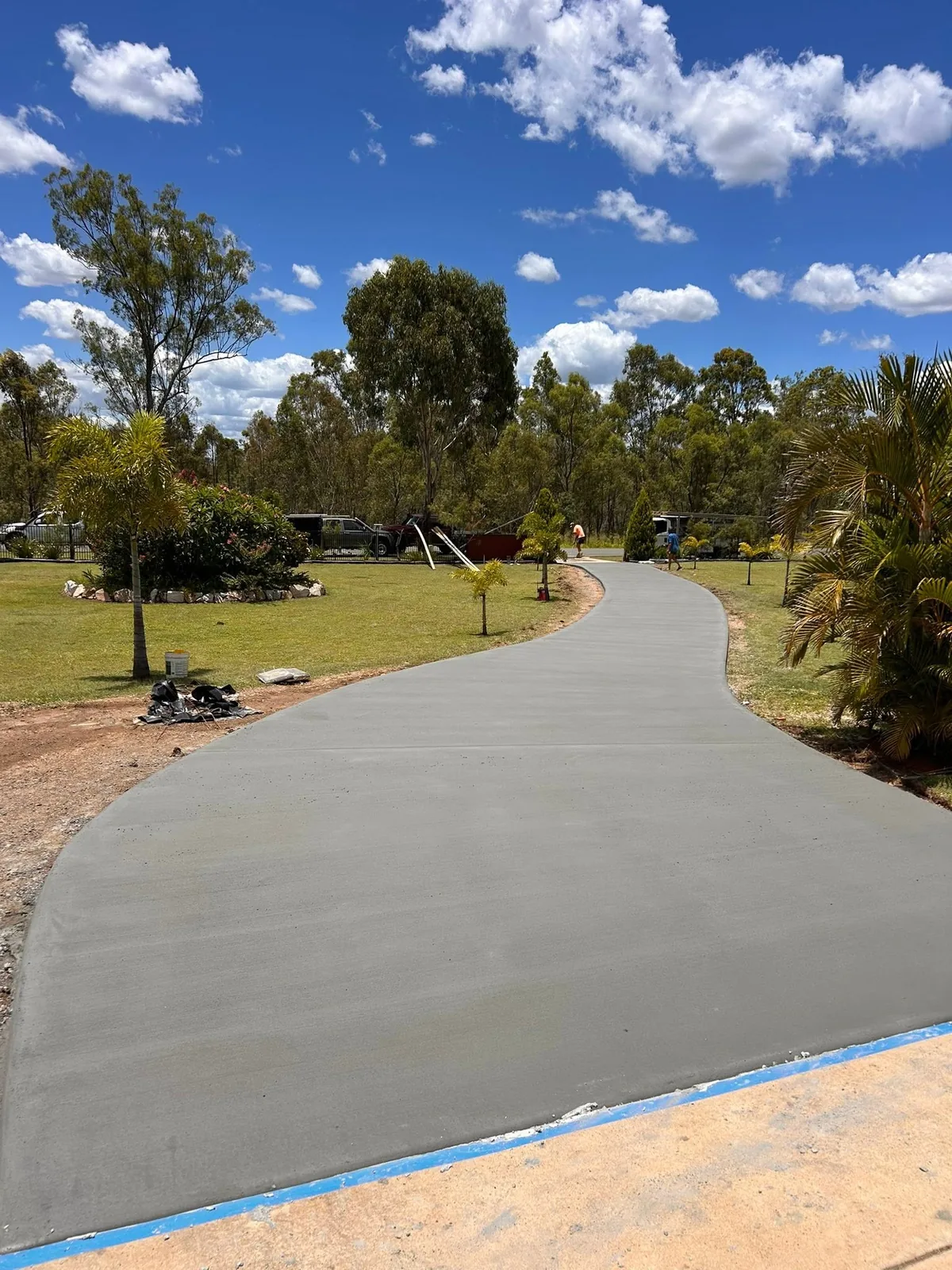 Curved driveway through a garden