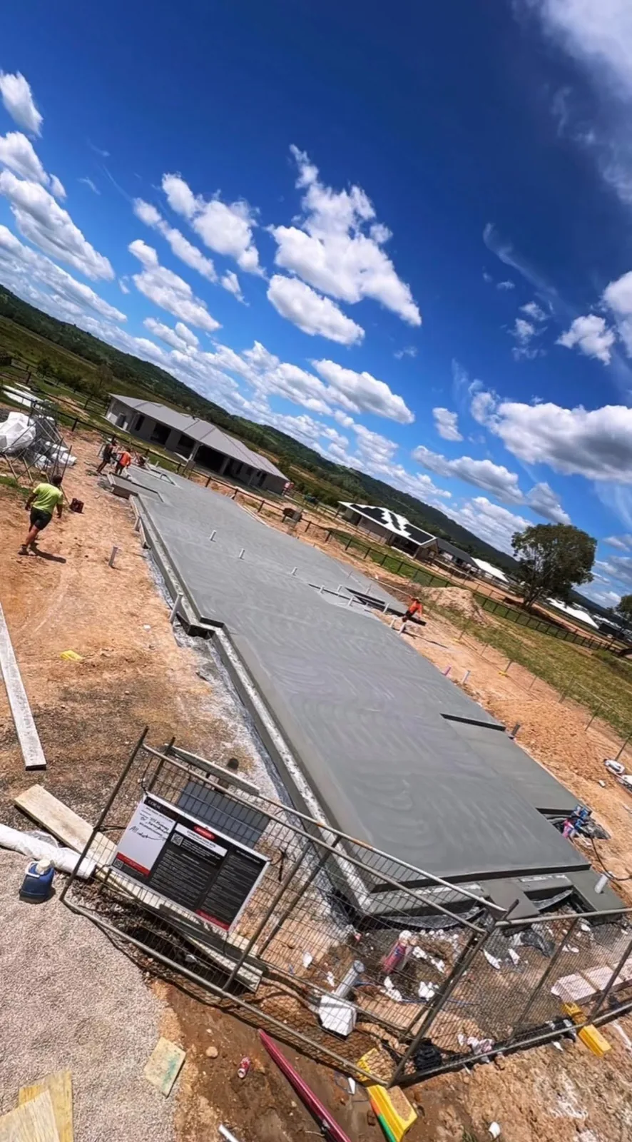 Crew finishing a large slab